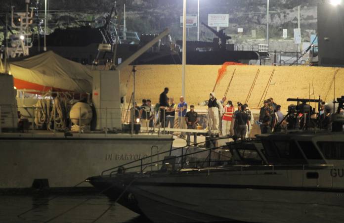 A migrant arrives at the port in Lampedusa after the Italian government allowed the disembarkation of 82 migrants on board the rescue ship Ocean Viking