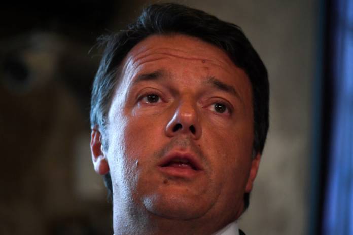 FILE PHOTO: Former Italian Prime Minister Matteo Renzi speaks at a news conference regarding his proposal for a transitional Italian government in Rome