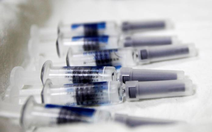 Vaccines are placed on a tray inside the Taipei City Hospital