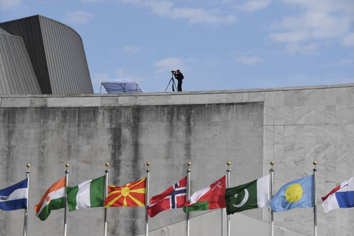 Security personnel is seen on top of United Nations during the United Nations General Assembly in New York City