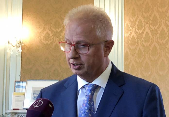 FILE PHOTO: Hungarian Justice Minister Laszlo Trocsanyi speaks to reporters on the sidelines of a conference on legislative issues in Budapest