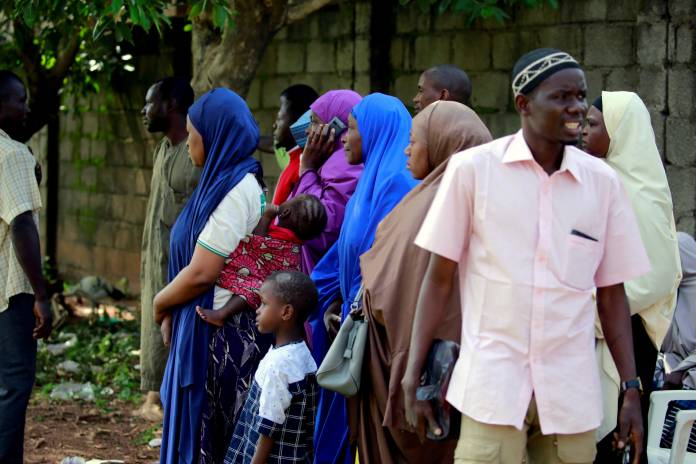 FILE PHOTO: Parents of some of the children rescued by police wait to see them at the Hajj transit camp in Kaduna