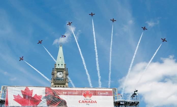 FILE PHOTO: The Snowbirds aerobatics team fly past the Peace Tower during Canada Day festivities on Parliament Hill in Ottawa