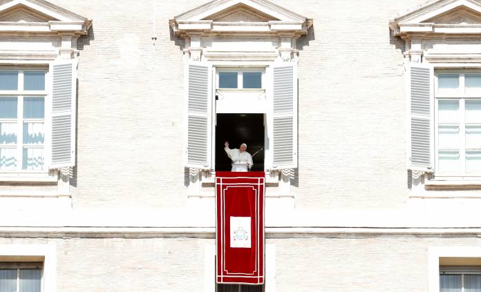 Pope Francis leads the Angelus prayer on St Peter's Square at the Vatican