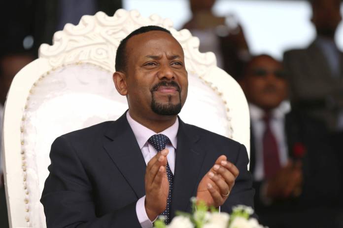 FILE PHOTO: Ethiopia's newly elected prime minister Abiy Ahmed attends a rally during his visit to Ambo in the Oromiya region