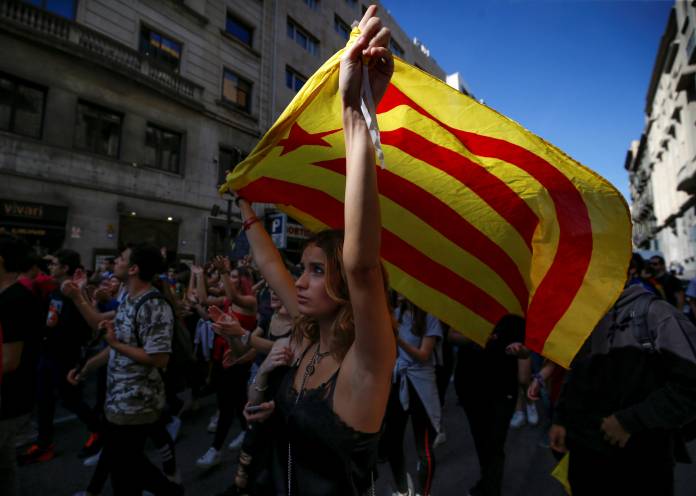 People gather for a protest in Barcelona