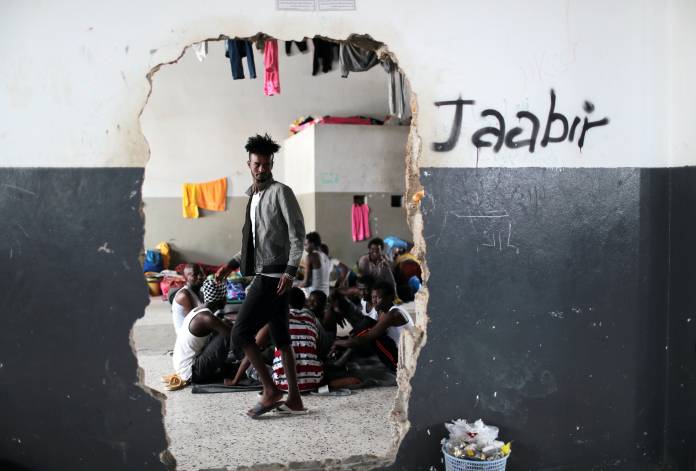 FILE PHOTO: Migrants are seen at the Anti-Illegal Immigration Agency in Tajora shelter center in Tripoli