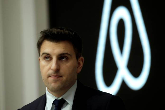 FILE PHOTO: Brian Chesky, CEO and Co-founder of Airbnb, speaks to the Economic Club of New York at a luncheon at the New York Stock Exchange (NYSE) in New York