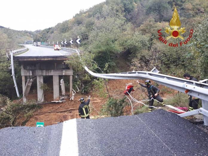 A portion of a motorway bridge linking Savona to Turin is seen after it collapsed due to a landslide near Savona