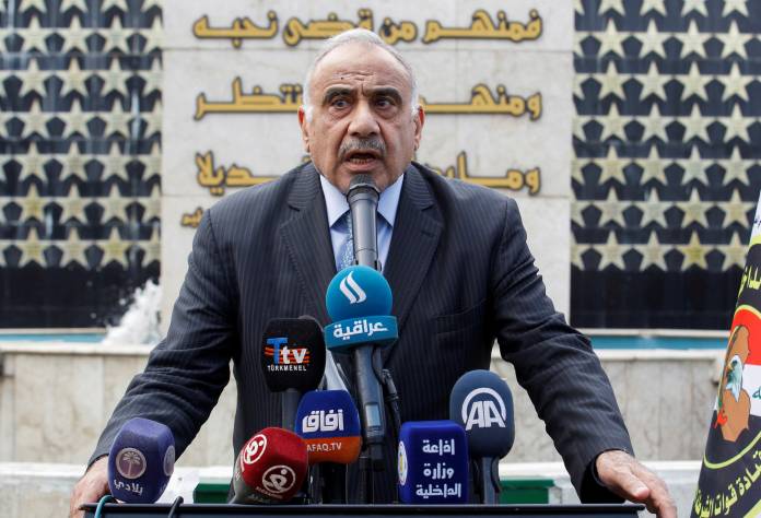 FILE PHOTO: Iraqi Prime Minister Adel Abdul Mahdi speaks during a symbolic funeral ceremony of Major General Ali al-Lami, who commands the Iraqi Federal Police's Fourth Division, who was killed in Salahuddin, in Baghdad