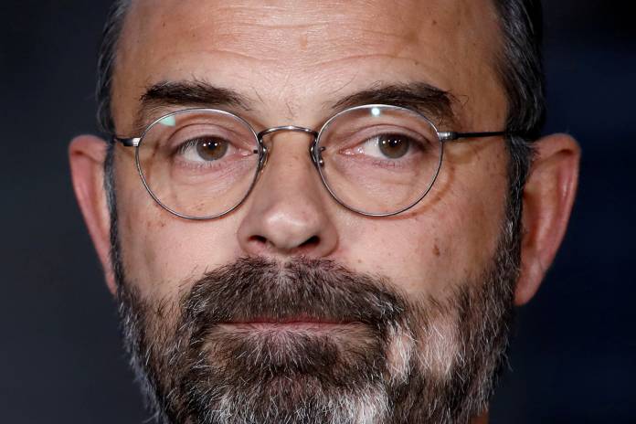 FILE PHOTO: French Prime Minister Edouard Philippe delivers a statement about the pensions reform plan at the Hotel Matignon in Paris