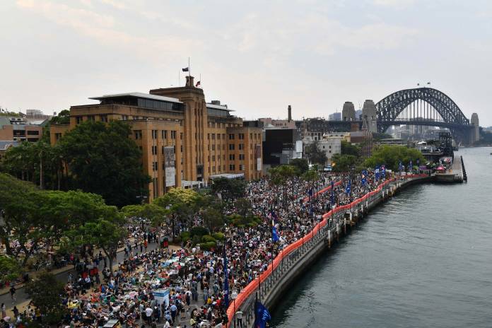 Crowds build around the Sydney Harbour foreshore at Circular Quay during New Year's Eve celebrations in Sydney