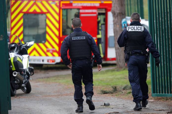 French police secure an area after a knife attack