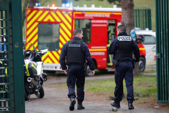 French police secure an area after a knife attack in a public park in Villejuif