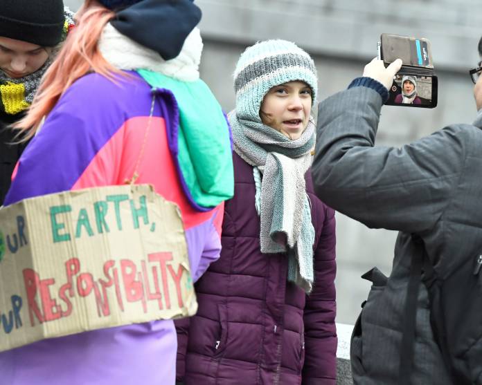 Swedish environmental activist Greta Thunberg celebrates her 17th birthday by attending the weekly