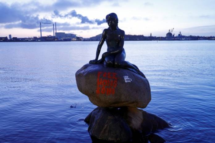 Denmark's most famous landmark, 'The Little Mermaid', is seen after unknown culprits wrote