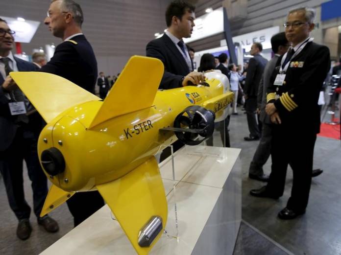 A model of ECA Robotics' K-Ster Mine Killer is displayed at the MAST Asia 2015 in Yokohama