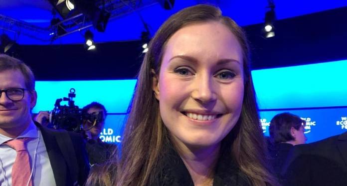 Finland’s-Prime-Minister-Sanna-Marin-poses-for-a-photo-at-the-World-Economic-Forum-Annual-Meeting-in-Davos-Switzerland.-January-22-2020.-Thomson-Reuters-Foundation_Belinda-Goldsmith