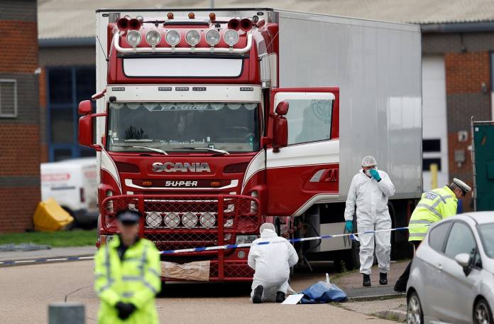 The scene where bodies were discovered in a lorry container, in Grays, Essex