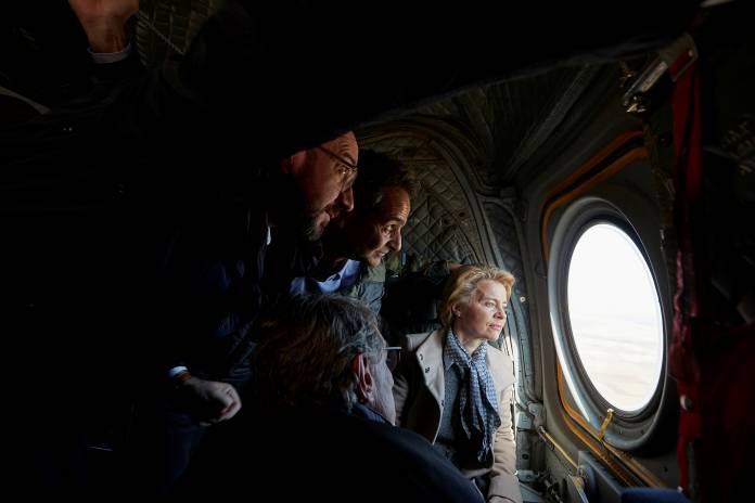 Greek Prime Minister Kyriakos Mitsotakis, European Commission President Ursula von der Leyen, European Council President Charles Michel and European Parliament President David-Maria Sassoli fly over the Greek-Turkish border, in the region of Evros
