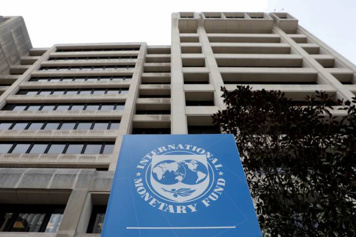 FILE PHOTO: The International Monetary Fund (IMF) headquarters building is seen ahead of the IMF/World Bank spring meetings in Washington FILE PHOTO: The International Monetary Fund (IMF) headquarters building is seen ahead of the IMF/World Bank spring meetings in Washington