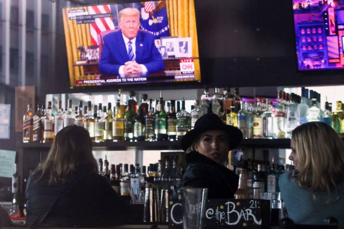 U.S. President Donald Trump's televised address to the nation is pictured in the bar at A Pizza Mart, in Seattle, Washington U.S. President Donald Trump's televised address to the nation is pictured in the bar at A Pizza Mart, in Seattle, Washington