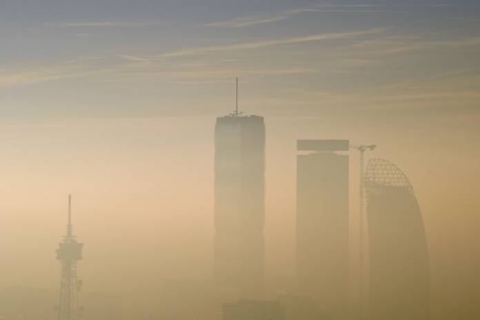FILE PHOTO: The Allianz Tower, the Libeskind Tower and the Generali Tower are pictured amidst dense fog and smog in Milan, Italy, January 8, 2020. REUTERS/Flavio Lo Scalzo FILE PHOTO: The Allianz Tower, the Libeskind Tower and the Generali Tower are pictured amidst dense fog and smog in Milan, Italy, January 8, 2020. REUTERS/Flavio Lo Scalzo