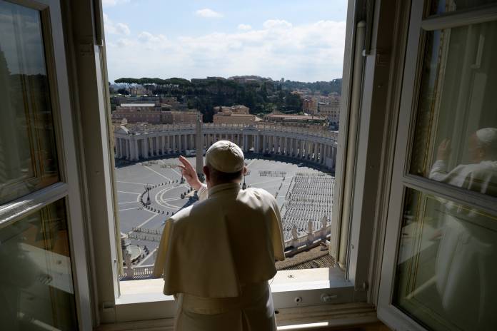 Pope Francis sends a virtual hug after delivering his weekly Angelus prayer via video at the Vatican Pope Francis sends a virtual hug after delivering his weekly Angelus prayer via video at the Vatican