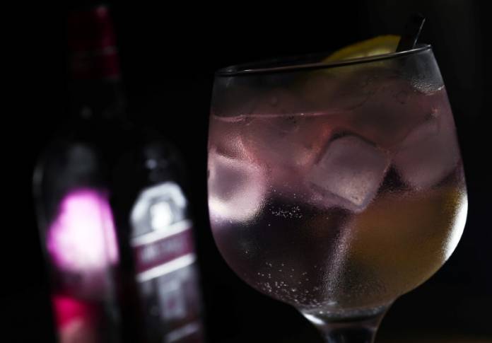 Greenall's Wild Berry pink gin is seen in a photo illustration in London Greenall's Wild Berry pink gin is seen in a photo illustration in London