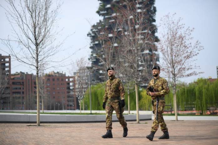 Italian army soldiers patrol streets after being deployed to the region of Lombardy to enforce the lockdown against the spread of coronavirus disease (COVID-19) in Milan Italian army soldiers patrol streets after being deployed to the region of Lombardy to enforce the lockdown against the spread of coronavirus disease (COVID-19) in Milan