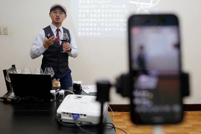 Sommelier Peter Petrus conducts online wine tasting classes in Taipei, during the global outbreak of the coronavirus disease