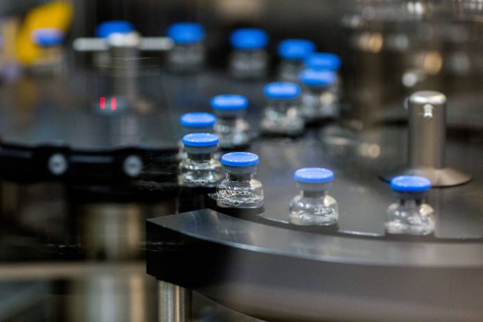 FILE PHOTO: Investigational remdesivir vials are capped at a Gilead Sciences facility in La Verne