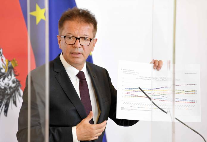 Austrian Health Minister Anschober attends a news conference in Vienna