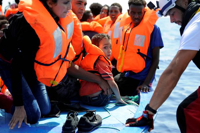 Migrants are rescued by SOS Mediterranee during a search and rescue (SAR) operation in the Mediterranean Sea