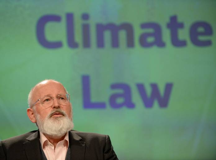 FILE PHOTO: European Commission Vice-President Frans Timmermans presents a new law for the bloc to achieve carbon neutrality by 2050 in Brussels