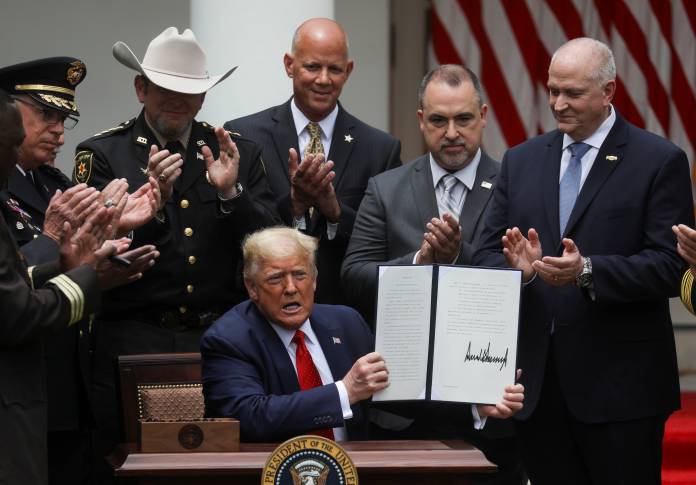 U.S. President Trump signs executive order on police reform at the White House in Washington