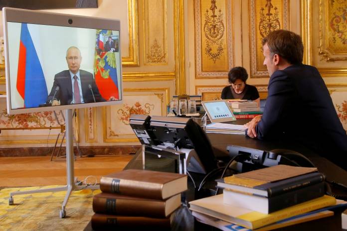 French President Emmanuel Macron holds a video meeting with Russian President Vladimir Putin