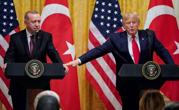 FILE PHOTO: U.S. President Donald Trump and Turkey's President Tayyip Erdogan hold a joint news conference at the White House in Washington