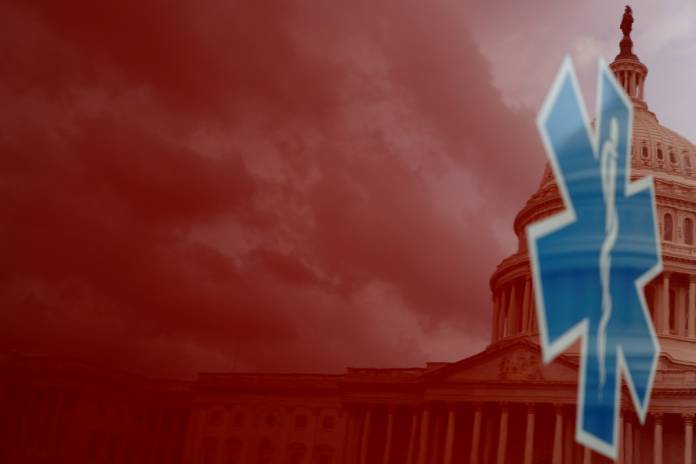 The U.S. Capitol Building is reflected against an ambulance along the East Front on Capitol Hill in Washington
