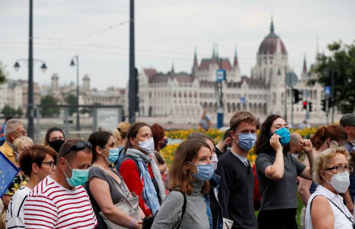 People take part in a protest for media freedom in Budapest