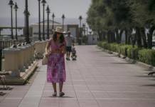 Covid-19: 11 new cases, no recoveries Woman-not-wearing-face-mask-after-new-measures